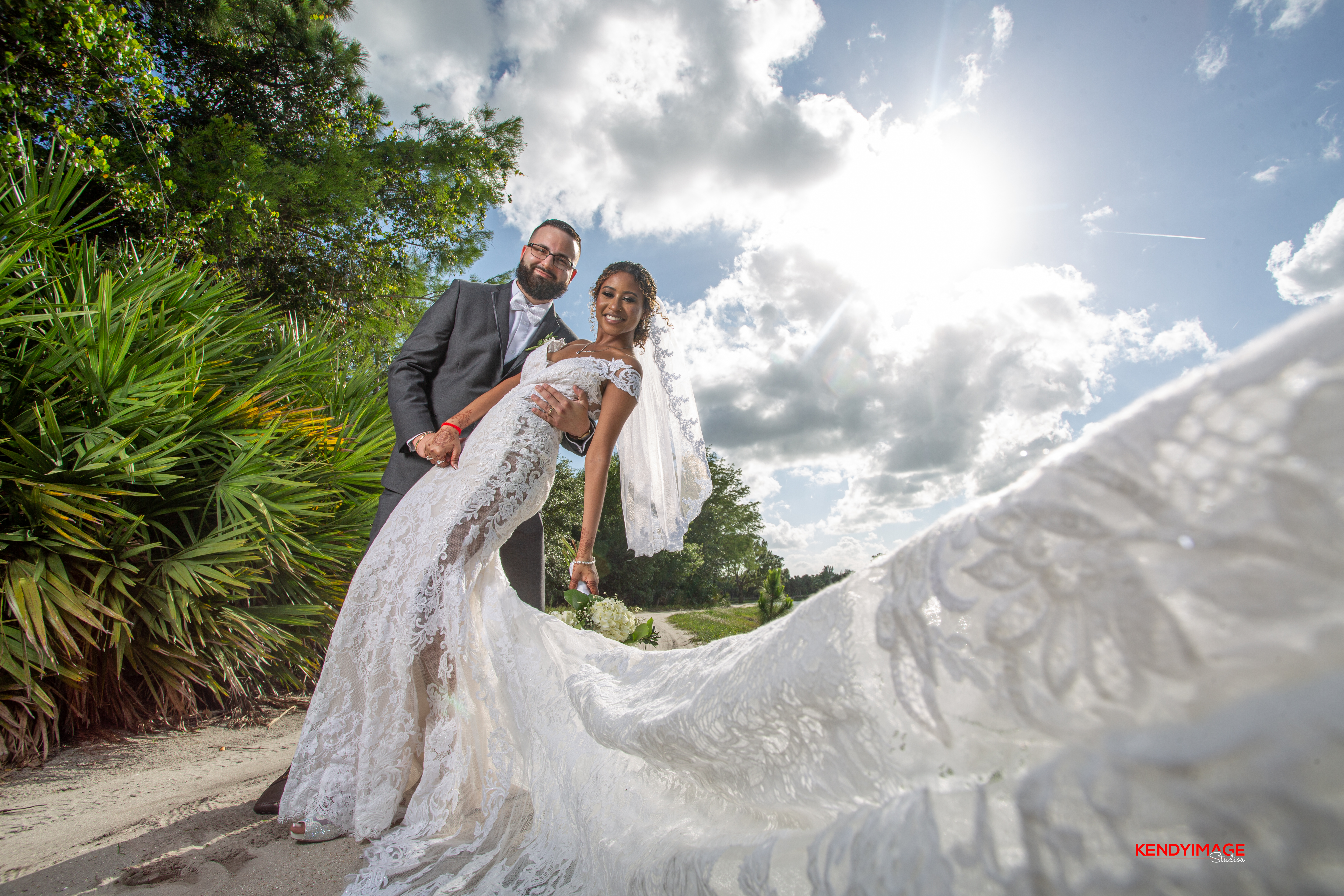 bride and groom on golf course